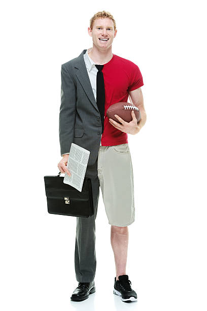 istock Split personality man with briefcase and football 528133735
