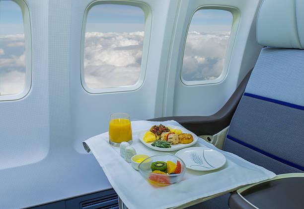 Lunch on board of airplane Airline Lunch served during long distance flight airplane food stock pictures, royalty-free photos & images