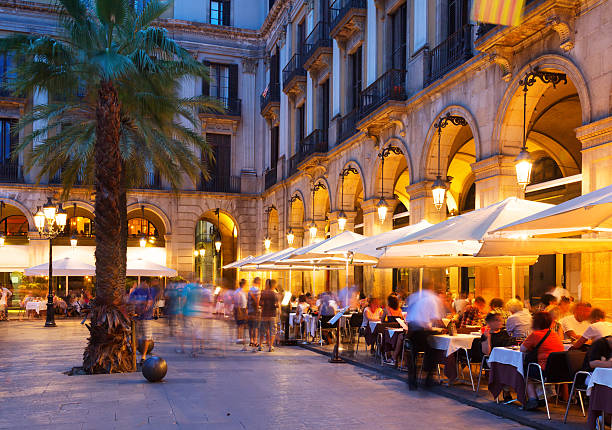 night view of Placa Reial night view of Placa Reial with restaurants in summer. Barcelona la rambla stock pictures, royalty-free photos & images