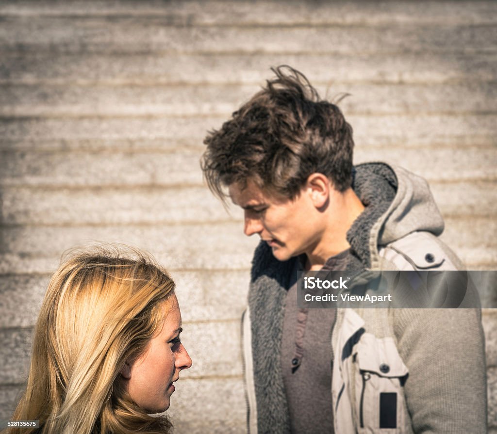 Couple in a moment of troubles during break up phase Couple in a moment of troubles during break up phase - Dramatic scenario with boyfriend and girlfriend and lack of communication - Concept of sadness within a love relationship Adult Stock Photo