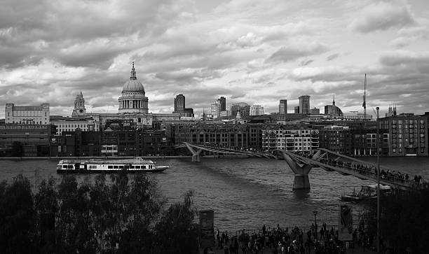 istock St Paul's Cathedral and Millennium Bridge in Black and White 528137095
