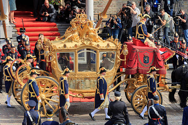 dutch royals arriving on binnenhof during prinsjesdag in the hague - prinsjesdag stockfoto's en -beelden