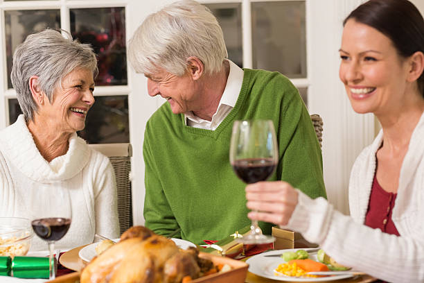 istock Senior couple laughing at christmas dinner 528148855