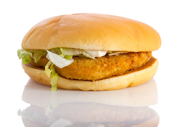 istock Chicken burger, isolated on white background. Close up. 528149811