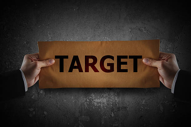 istock Business holding sign target on paper 528150379