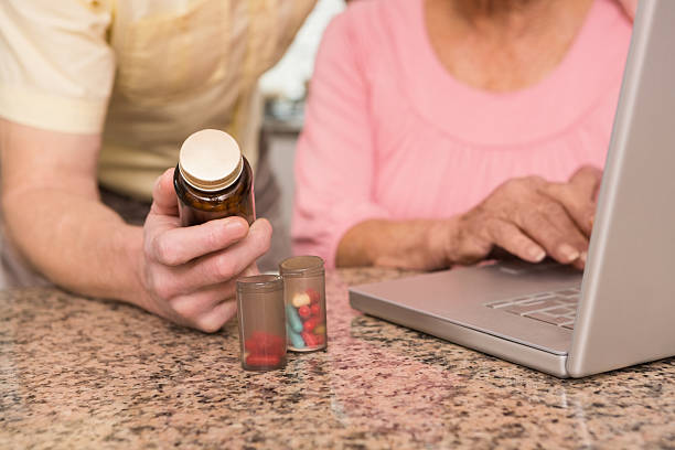 istock Senior couple looking up medication online 528150615