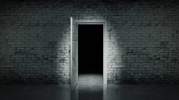 istock 3d open door in a white vintage brick wall 528151269