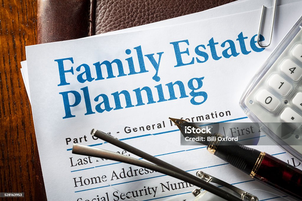 Estate Planning Estate Planning with pen, glasses, and caculator Will - Legal Document Stock Photo