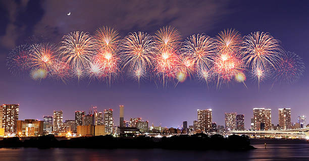 istock Fireworks celebrating over Tokyo cityscape at nigh 528164423