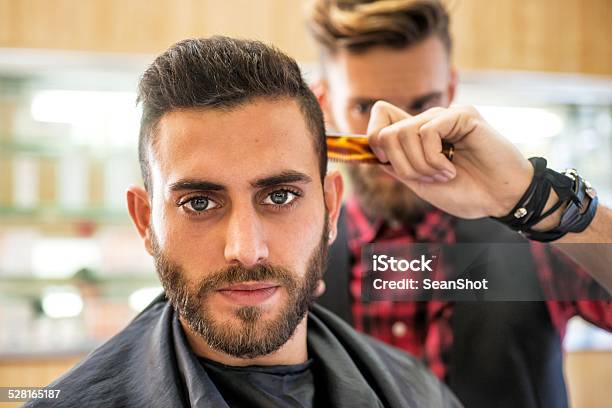 Young Man At The Barber Stock Photo - Download Image Now - Men, Cutting Hair, Hairstyle