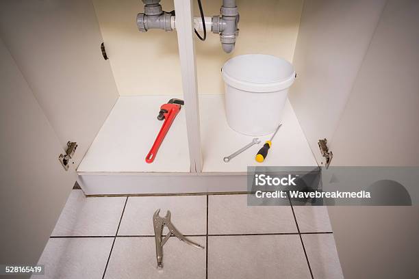 Plumbing Tools Under The Sink Stock Photo - Download Image Now - Bucket, Day, Domestic Kitchen