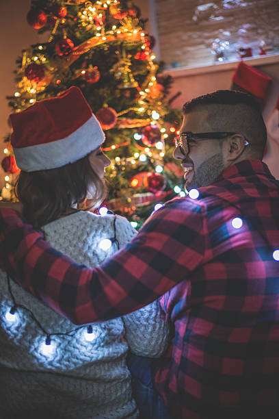 istock Young couple in cristmas romance 528165743