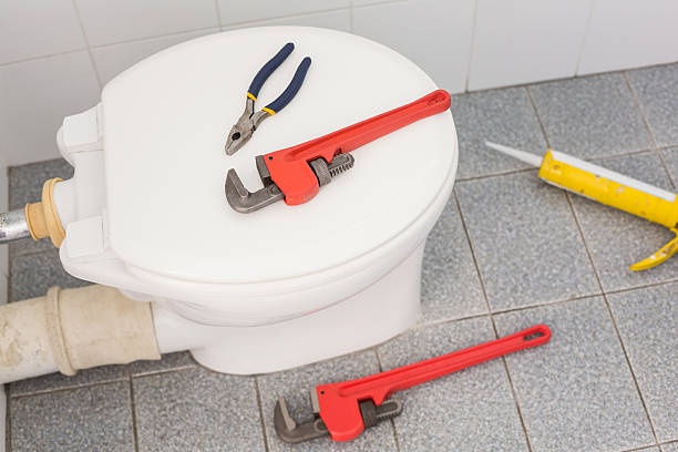istock Plumbing tools on the toilet 528166095