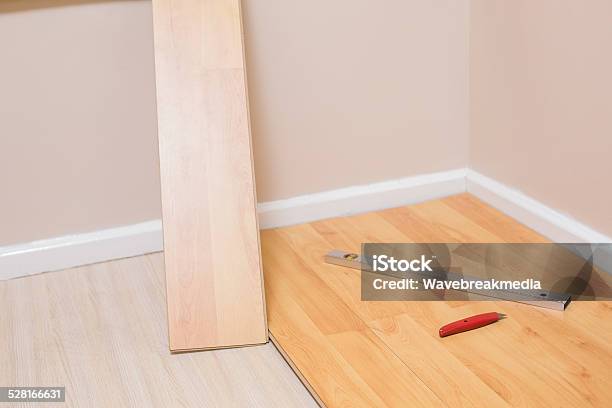 Planks Being Put Down On Floor Stock Photo - Download Image Now - 30-39 Years, 35-39 Years, Adult