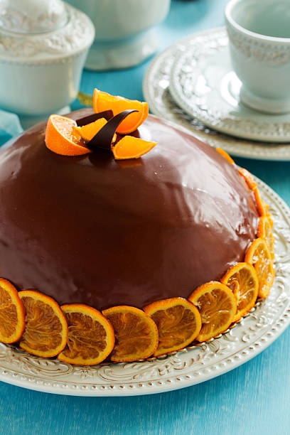 istock Orange-chocolate cake with white chocolate mousse. 528179229