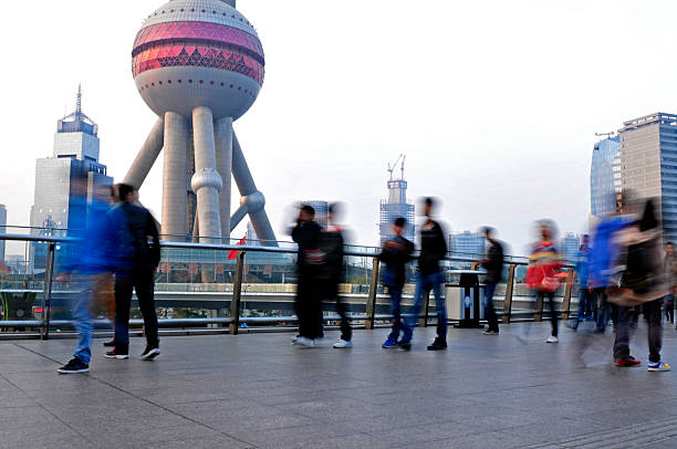 istock Passengers walk on the sidewalk, in Shanghai, China 528179801