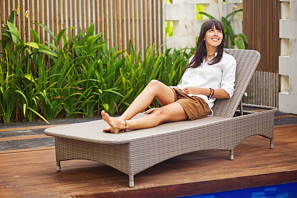 istock Woman on a sunbed 528180569