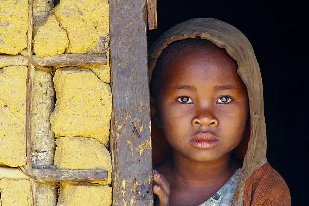 Madagascar-shy and poor african girl with headkerchief
