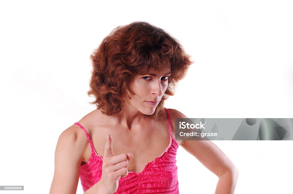 Angry woman portrait Angry woman portrait looking at camera and making threatening gestures Shaggy Fur Stock Photo