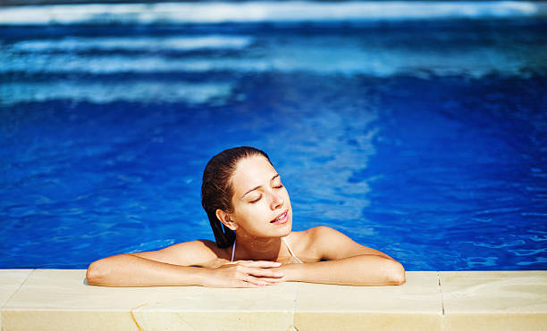 istock Woman in pool 528183223