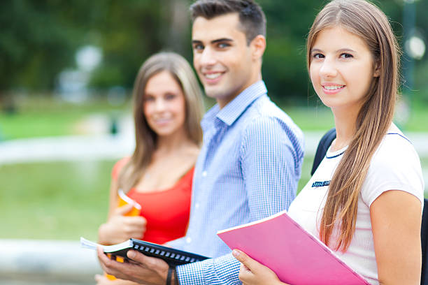 istock Group of students at the park 528183455