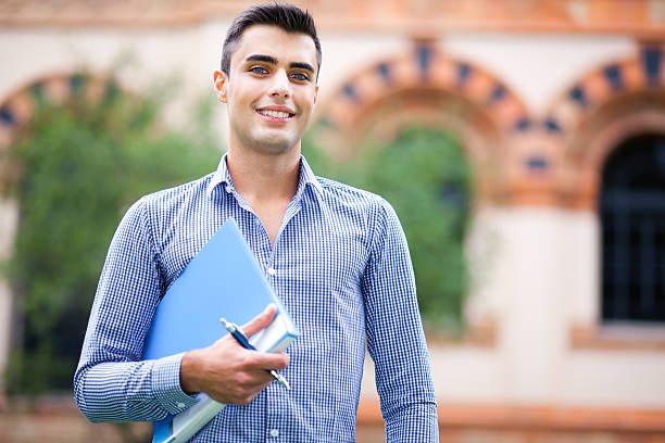 istock Male student at the park 528183457