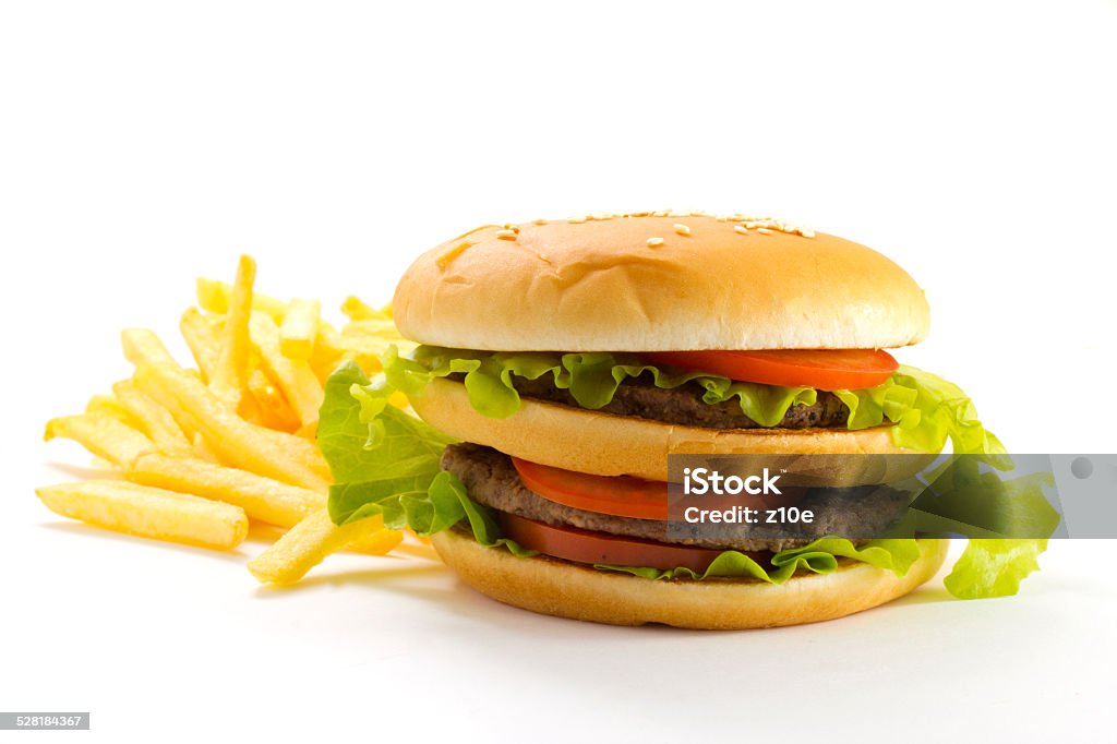 Big and tasty hamburger and fried potatoes isolated Big and tasty hamburger and fried potatoes isolated on white background Beef Stock Photo