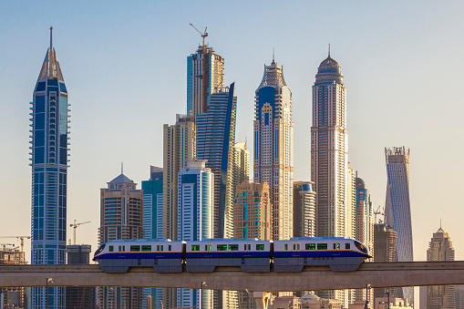 View of Dubai with subway and skycrapers.