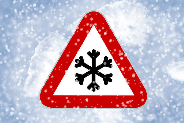Traffic sign Snow on the road stock photo