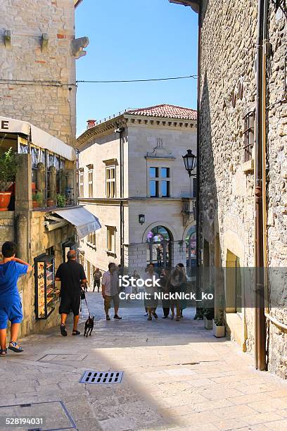Tourists See The Sights Of San Marino Stock Photo - Download Image Now - Alley, Ancient, Architecture