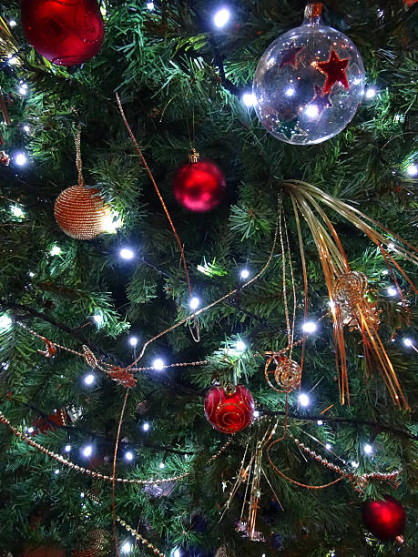 istock Artificial Christmas-tree, red / gold decorations, glass baubles, plastic pearl-chains / streamers 528194133
