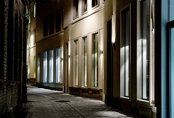 istock Narrow alley at night 528194225