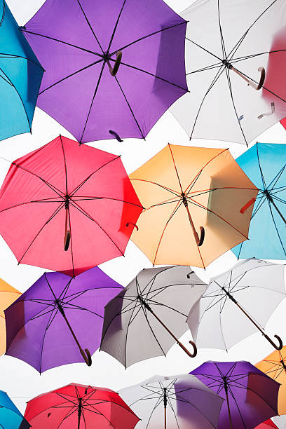 istock Colorful umbrellas on white background 528195061