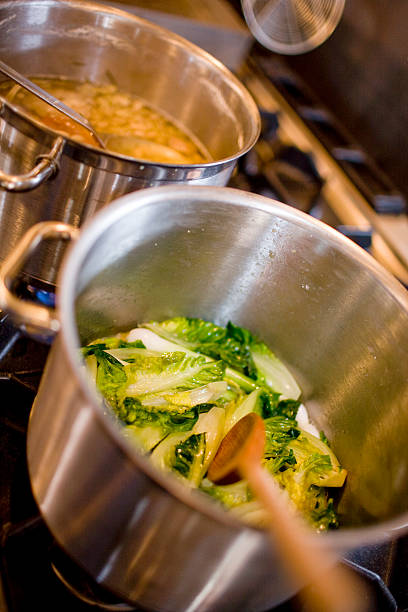 istock Cabbage sweating down in a metal sauspan 528195651