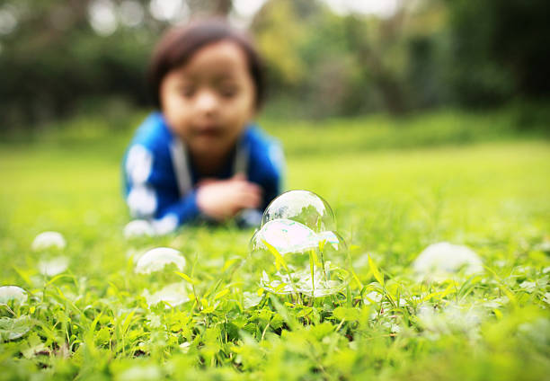 istock Cute children playing in the park 528195815