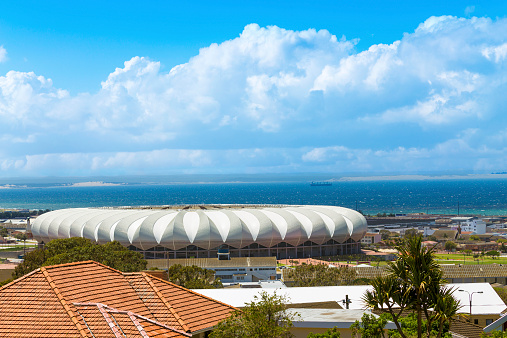Port Elizabeth, South Africa - December, 6th 2014: Nelson Mandela Bay Stadium in Port Elizabeth with the Ocean seen above. This stadium was built for the Fifa World Cup in 2010.