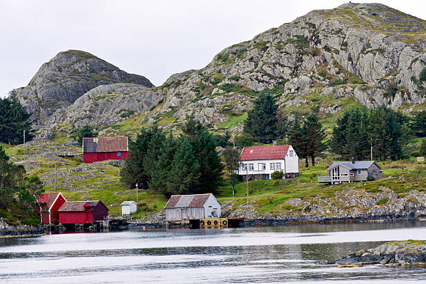 istock Rugged  coastline with shoreside buildings, near Bergen, Norway 528198845