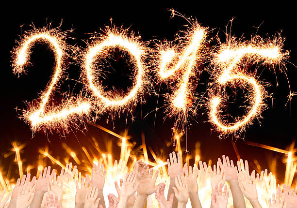 istock people celebrating the new year 2015 528198863