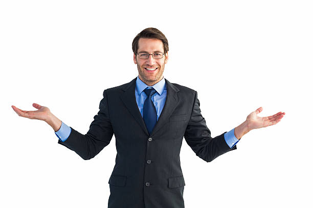 istock Businessman with open hands looking at the camera 528212125