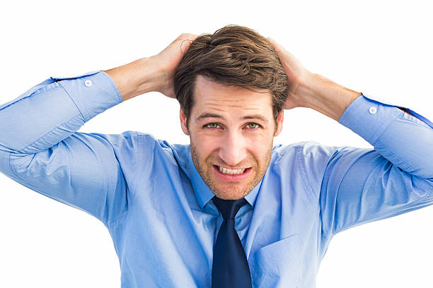istock Stressed businessman with hands on head 528212419