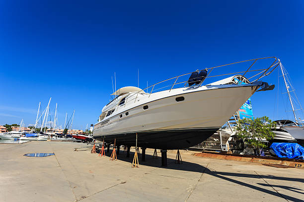 istock Luxury yacht beached for annual service and repair 528214523