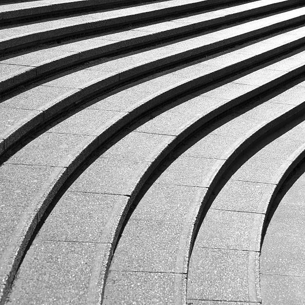 Abstract architecture, steps and shadows in black and white stock photo