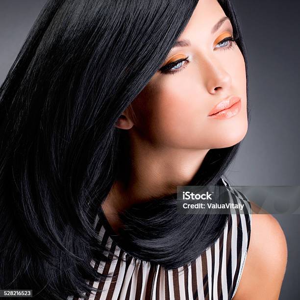 Beautiful Brunette Woman With Long Black Straight Hair Stock Photo - Download Image Now