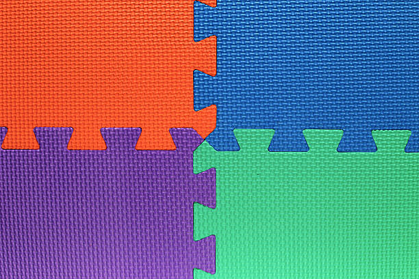 istock four color fields with pieces of puzzle 528216953