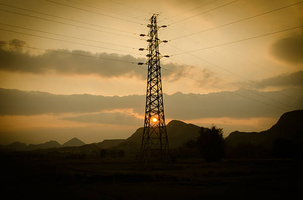 istock electricity pylons silhouette on the sky 528218479