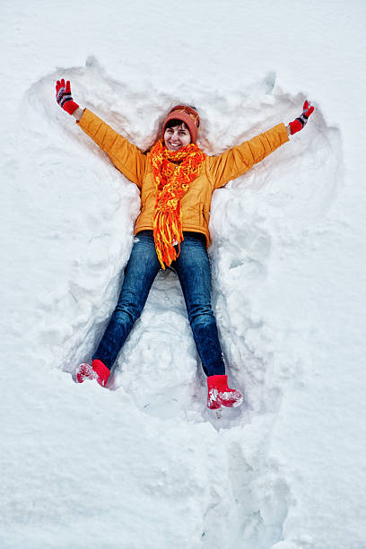 istock Young woman in the snow 528219599