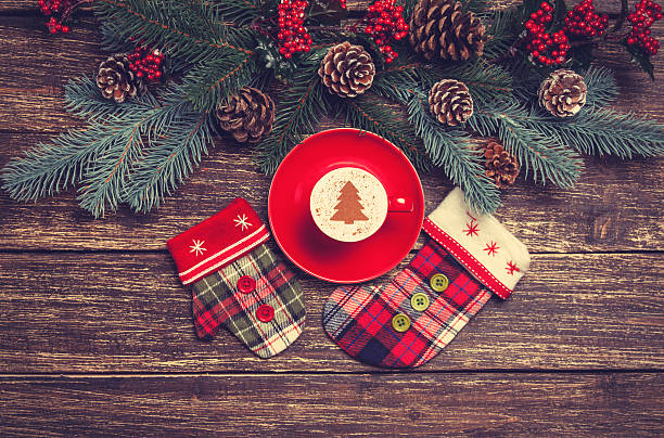 istock Hot cappuccino with christmas tree shape on a wooden table 528239683