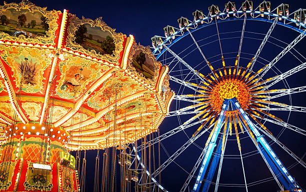 Beer Fest famous ferris wheel at the Beer Fest in munich - germany amusement park stock pictures, royalty-free photos & images