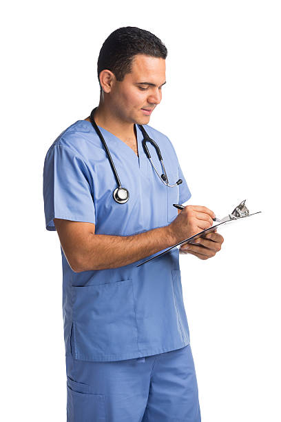 istock Male doctor writing on a clipboard 528241973