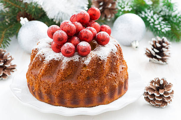 istock Christmas cake on a plate and decorations 528242357